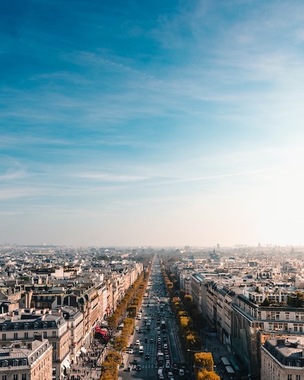 Photo of the Champs-Élysées in Paris during the day.